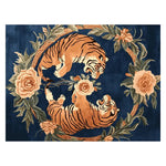 A stunning area rug featuring an intricate design of two roaring tigers surrounded by lush floral patterns on a deep blue background. Perfect for large living rooms, this 8x10 wool rug combines the elegance of a vintage rug with the vibrant colors of a floral rug, adding a bold statement to any space.