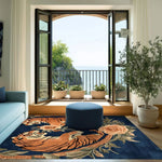 A vibrant hand-tufted wool area rug featuring a stunning abstract tiger design with floral elements, perfect for large living rooms. This 8x10 vintage-style rug adds a bold touch to a modern space, set against a serene view through open doors leading to a balcony overlooking a scenic landscape.