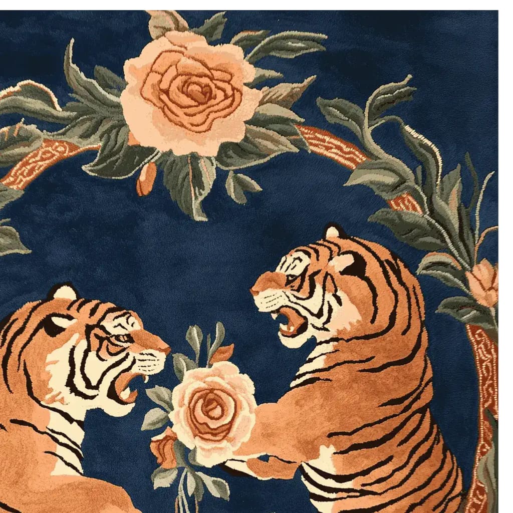 This vibrant area rug features an exquisite design of two roaring tigers surrounded by lush floral details, set against a deep blue background. Perfect for large living room spaces, this 8x10 wool rug combines vintage charm with modern elegance, making it an ideal choice for those looking to enhance their decor with a unique floral rug.