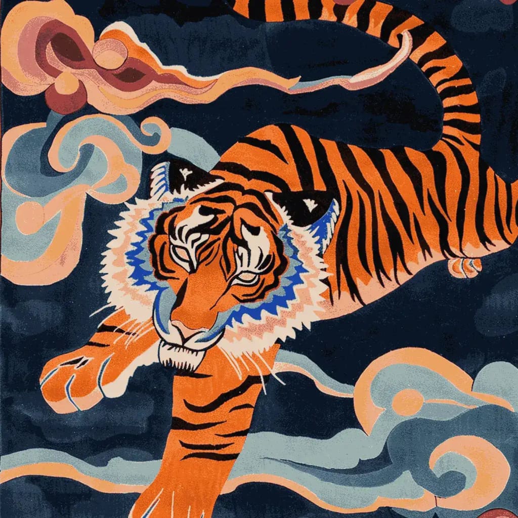 This vibrant area rug features a striking abstract design of a tiger in bold orange and black hues, set against a deep blue background. Crafted from high-quality wool, this eye-catching rug is perfect for adding a touch of artistry to your living room. Ideal for those seeking unique wool rugs and area rugs for living room spaces.