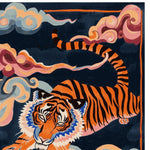 Vibrant and artistic area rug featuring a striking abstract tiger design against a dark background, perfect for adding a bold statement to any living room. This hand-tufted wool rug brings a touch of the wild into your home decor, making it an ideal choice for those looking to enhance their space with unique area rugs for living room.