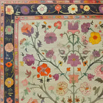 A beautifully detailed hand-knotted area rug with a vibrant floral design, perfect for adding a touch of elegance to your living room. This Persian-style rug features an array of colorful flowers and intricate patterns, making it an ideal choice for those seeking a unique floral rug or high-quality rugs for living room decor.