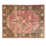 Beautiful Rosaire Grandeur Knotted Wool Area Rug featuring a stunning floral design. This elegant floral rug, perfect for adding a touch of sophistication to your living room, showcases intricate pink and green patterns that enhance any decor.