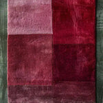 A vibrant Rose Luxe Hand Tufted Wool Rug Runner featuring a rich palette of reds and pinks, perfect for adding a contemporary touch to your living room or as a stylish hallway runner rug. This elegant area rug is made of high-quality wool, making it an ideal choice for kitchen rugs, kitchen runner rugs, or even a bathroom runner rug.
