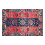 A vibrant Rosetta Passage hand-tufted wool rug featuring an intricate floral design. This area rug in red and navy blue is perfect for adding a touch of elegance to any living room. Ideal as a living room area rug, this 8x10 floral wool rug combines traditional charm with modern style.