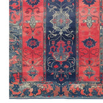 A vibrant Rosetta Passage hand-tufted wool rug featuring an intricate floral design in rich blue and red tones. This elegant area rug is perfect for adding a touch of sophistication to living room spaces. Ideal for those seeking living room area rugs, this floral rug is crafted from wool and available in an 8x10 size.