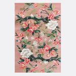The Rosy Cascade Hand Tufted Rug features a stunning floral design with lush pink and white blossoms against a soft background. This elegant area rug, crafted from high-quality wool, is perfect for a large living room setting. Its vintage charm and vibrant colors make it an ideal choice for those seeking floral rugs or rugs for living room decor.