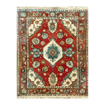 Top view of the Rosy Retreat Hand Knotted Area Rug, a stunning vintage rug featuring intricate Persian designs in vibrant red, blue, and ivory. Perfect for large living rooms, this elegant rug enhances any space with its timeless beauty.