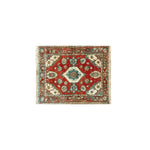 Rosy Retreat Hand Knotted Area Rug featuring a vibrant vintage design. This large living room rug showcases intricate Persian patterns in rich reds and blues, ideal for adding a touch of elegance to any space.
