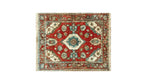 Rosy Retreat Hand Knotted Area Rug featuring a vibrant vintage design. This large living room rug showcases intricate Persian patterns in rich reds and blues, ideal for adding a touch of elegance to any space.
