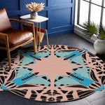 A stylish round abstract butterfly hand-tufted area rug in blue, perfect for contemporary spaces. This wool rug adds a modern touch to any bedroom or living room, offering an artistic flair to your home decor. Ideal as an area rug for living rooms or as a chic addition to rugs for bedrooms.