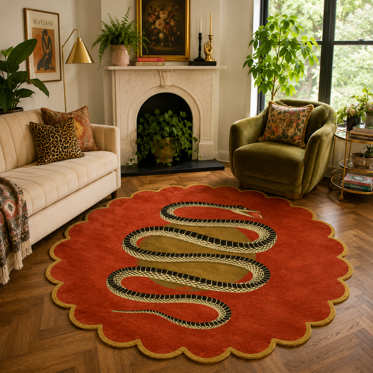 A round red area rug with a scalloped edge and a large black, beige, and gold snake design in the center, shown in a styled living room with a cream sofa, green armchair, and fireplace.