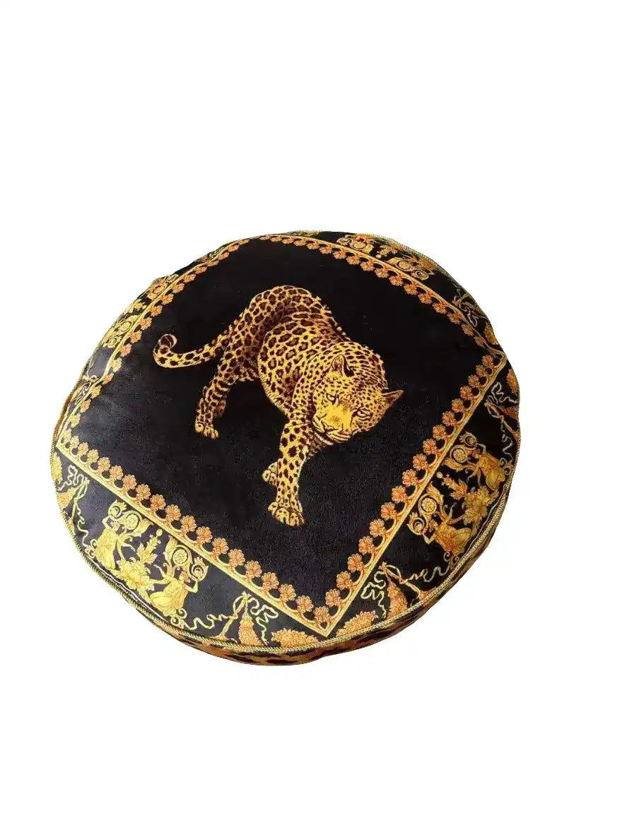 Round velvet throw pillow featuring a striking leopard design, perfect for adding a touch of elegance to your home decor.
