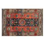The Royal Blossom Hand Knotted Area Rug features a stunning vintage design with intricate floral patterns in rich red and navy tones, ideal for adding elegance to any living room. This Persian-style rug blends traditional craftsmanship with modern aesthetics, perfect as a centerpiece in your home decor.
