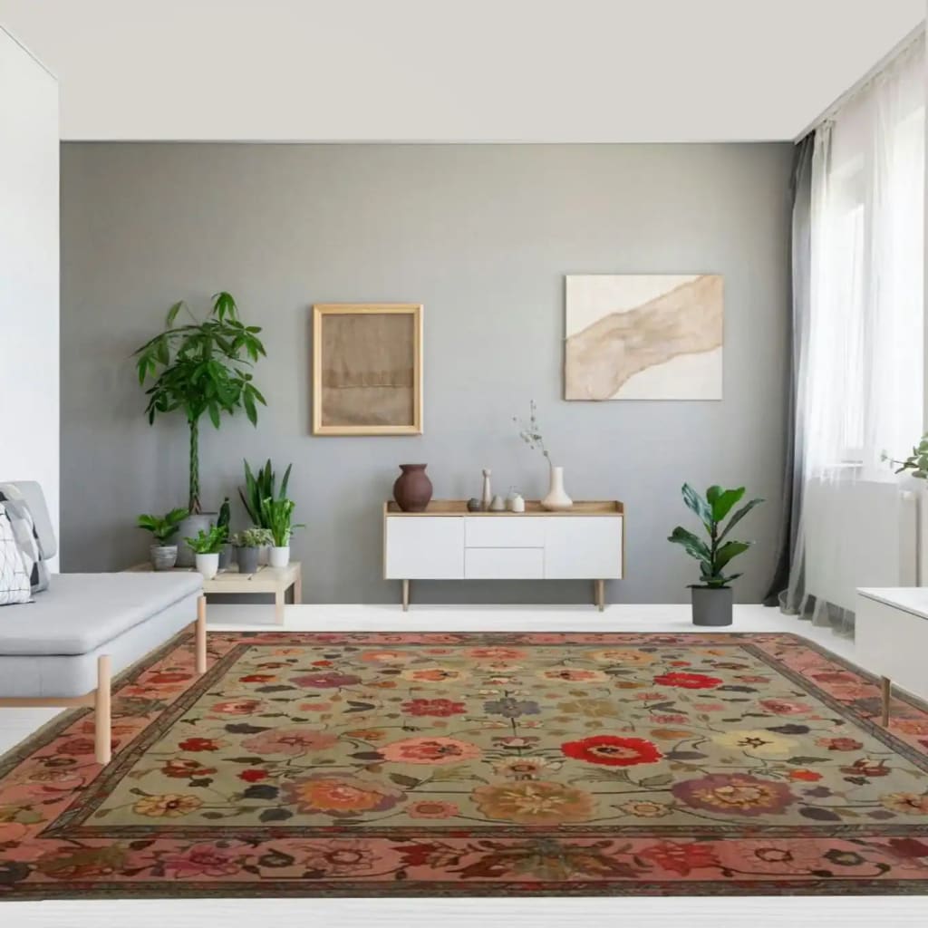 A stylish living room featuring a Royal Elegance Hand Knotted Area Rug with a vintage floral design. This large square area rug adds a touch of Persian elegance to the modern decor. The wool rug's vibrant colors and intricate patterns make it a perfect centerpiece for both living room and bedroom spaces.