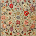 Beautiful Royal Elegance hand-knotted area rug showcasing a vibrant floral design, perfect as a square area rug for living room or bedroom. This large living room rug features a vintage Persian style in soft wool, adding a touch of elegance and color to any space.