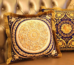 Royal fringed jacquard throw pillow with intricate gold and navy design, perfect for adding elegance to any decor.