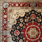 Detailed view of a Royal Persian Hand Knotted Area Rug featuring an intricate floral pattern with rich red, black, and beige tones. Perfect for adding a vintage touch to dining or living rooms, this square rug is crafted from high-quality wool, showcasing traditional Persian design elements ideal for dining room area rugs.