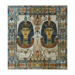 The Royal Pyramid Tapestry Hand Knotted Area Rug showcases a vibrant design featuring intricate Egyptian motifs, with two pharaoh figures surrounded by detailed floral patterns. This vintage rug is an ideal centerpiece for area rugs for living room settings, adding a touch of Persian rug elegance to your home decor.