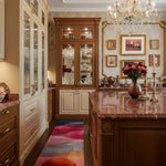 Ruby Color Play runner in a classic kitchen, pink and ruby watercolor wave layers on wood floor