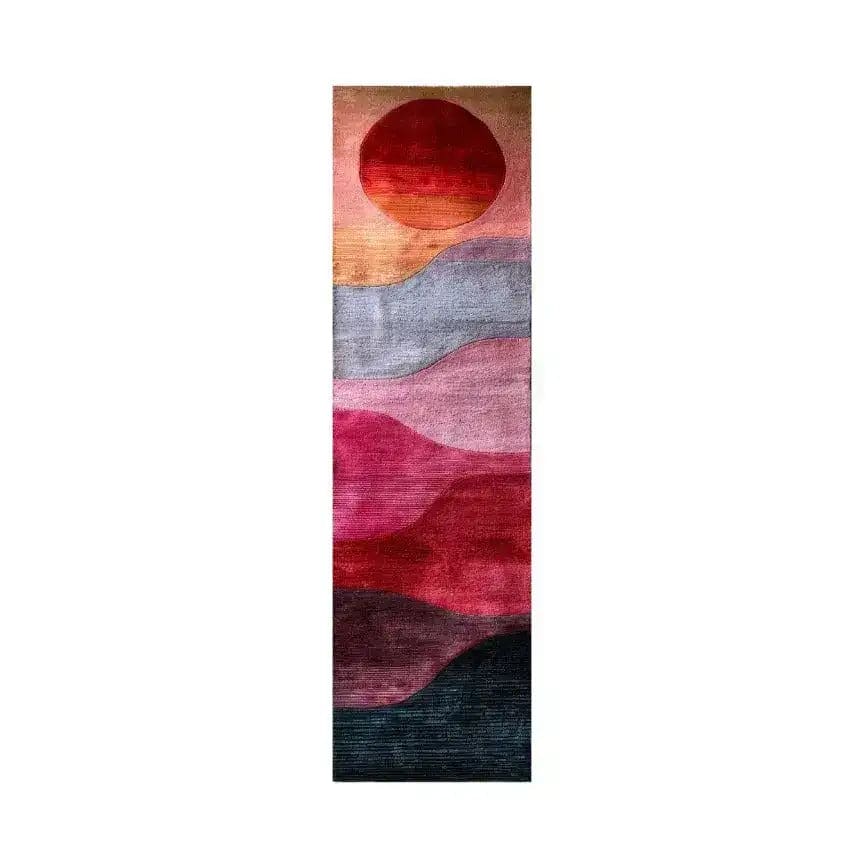 A stunning Ruby Color Play hand tufted wool rug runner featuring an abstract design with rich shades of red, pink, and blue, perfect for adding a contemporary touch to any space. Ideal as an area rug for hallways, kitchens, or living rooms, this versatile piece enhances the aesthetic with its vibrant colors and quality wool construction.