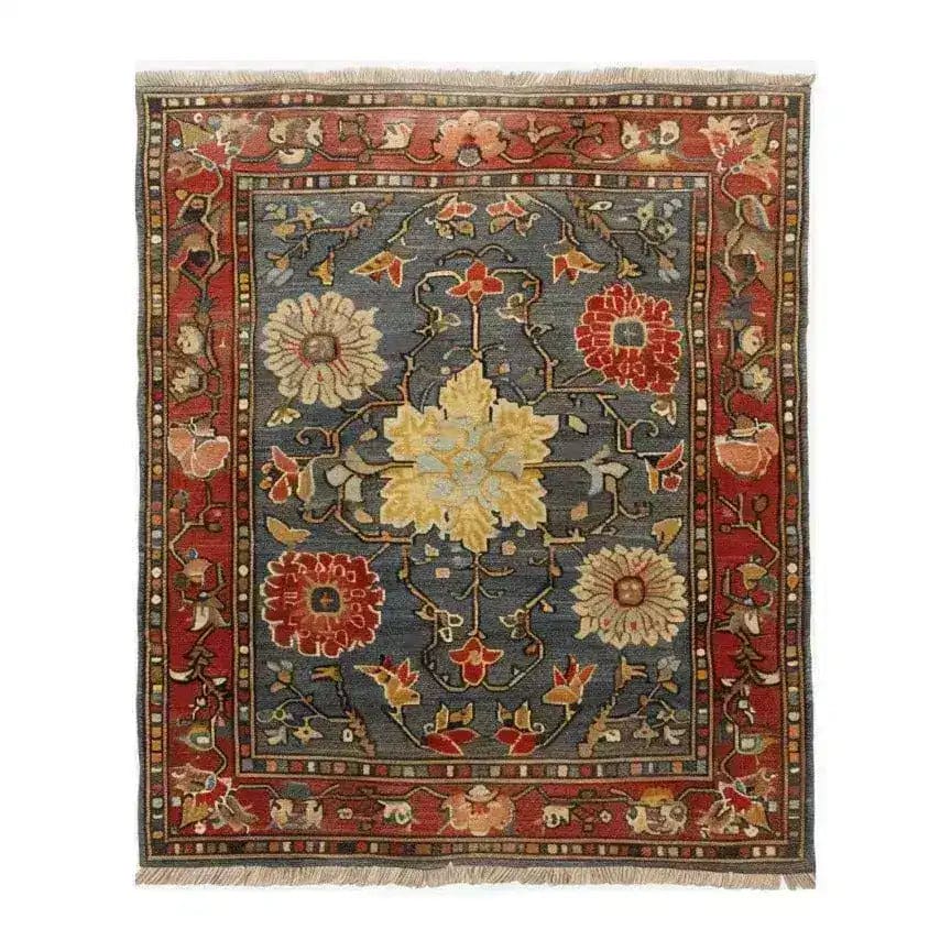 A stunning Rustic Elegance Hand Knotted Area Rug showcasing a vintage Persian design. This living room area rug features a bold floral pattern with vibrant red, blue, and yellow hues, perfect for adding a touch of classic charm to any space.