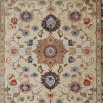 This image showcases a beautifully intricate Rustic Floral Design Hand Knotted Area Rug, perfect for large living room spaces. The vintage rug features an exquisite floral pattern with rich colors, reminiscent of traditional Persian rugs. Ideal for those seeking elegant living room area rugs with a timeless appeal.