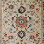 This image showcases a beautifully intricate Rustic Floral Design Hand Knotted Area Rug, perfect for large living room spaces. The vintage rug features an exquisite floral pattern with rich colors, reminiscent of traditional Persian rugs. Ideal for those seeking elegant living room area rugs with a timeless appeal.