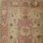 A beautifully crafted Rustic Heritage Hand Knotted Area Rug featuring intricate vintage designs. The rug showcases a harmonious blend of soft pastel colors, with floral and ornate patterns typical of Persian rugs, perfect for adding elegance to any living room.