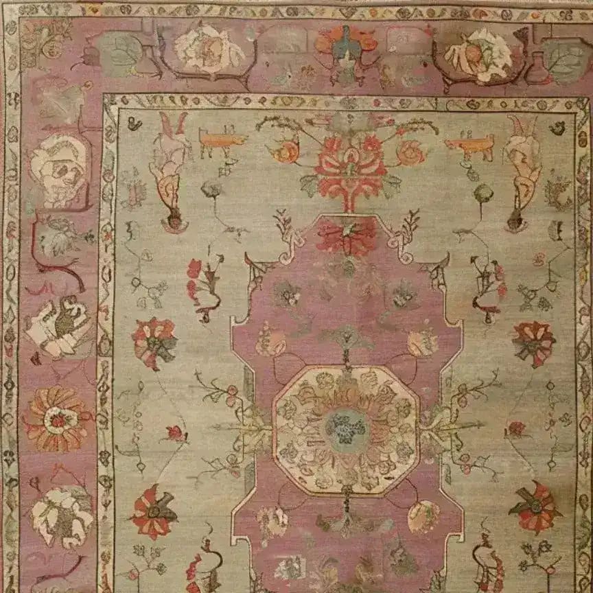 A beautifully crafted Rustic Heritage Hand Knotted Area Rug featuring intricate vintage designs. The rug showcases a harmonious blend of soft pastel colors, with floral and ornate patterns typical of Persian rugs, perfect for adding elegance to any living room.