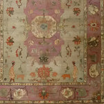 This Rustic Heritage Hand Knotted Area Rug features a vintage design with intricate floral and ornate patterns, perfect for adding elegance to any living room. The Persian rug showcases a harmonious blend of earthy tones with detailed craftsmanship.
