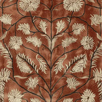 A beautifully detailed hand-tufted wool rug featuring a vintage floral design in soft cream against a rustic brown background, perfect for enhancing living room decor with a touch of elegance. This area rug adds warmth and character, ideal for those seeking quality living room area rugs with a timeless appeal.