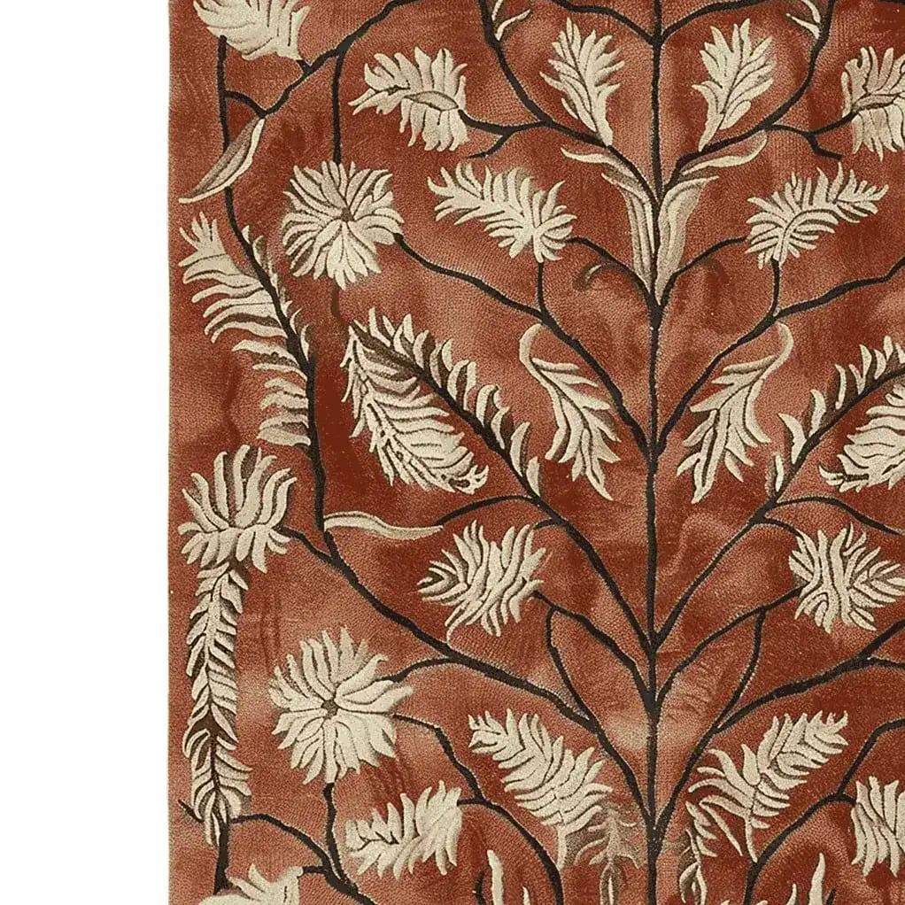 A close-up view of the Rustic Meadow Hand Tufted Area Rug showcasing intricate floral patterns in cream and brown hues. This wool rug adds a touch of vintage charm, perfect for enhancing living room decor with its elegant design. Ideal for those seeking stylish area rugs for living rooms.