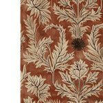The Rustic Thistle Hand Tufted Rug showcases a beautiful vintage-inspired design with intricate thistle patterns in earthy tones. This wool rug offers a cozy and stylish addition to any living room, making it a perfect choice for those seeking large living room area rugs that combine elegance with comfort.