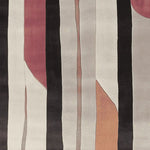 A contemporary area rug featuring a hand-tufted design with abstract patterns in shades of black, red, and beige. This wool rug is perfect for adding a modern touch to living room spaces, offering both style and comfort.