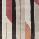 A contemporary area rug featuring a hand-tufted design with abstract patterns in shades of black, red, and beige. This wool rug is perfect for adding a modern touch to living room spaces, offering both style and comfort.