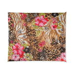 King comforter blending leopard and zebra animal print with pink hibiscus blooms and green leaves