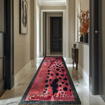 A stylish hallway featuring a Safari Streak Hand Tufted Wool Runner Rug with an abstract animal pattern in vibrant colors. This contemporary area rug adds a touch of elegance and modern design, making it a perfect choice for kitchen rugs, hallway runner rugs, or large living room rugs. Its wool construction ensures durability, ideal for use as a kitchen runner rug, bathroom runner rug, or as a statement piece in the living room.