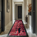 A stylish hallway featuring a Safari Streak Hand Tufted Wool Runner Rug with an abstract animal pattern in vibrant colors. This contemporary area rug adds a touch of elegance and modern design, making it a perfect choice for kitchen rugs, hallway runner rugs, or large living room rugs. Its wool construction ensures durability, ideal for use as a kitchen runner rug, bathroom runner rug, or as a statement piece in the living room.
