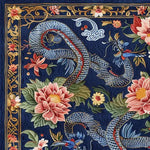 A beautifully detailed Sanctuary of Dreams hand-tufted wool rug featuring a vintage design with intricate floral patterns and a dragon motif on a rich blue background. Perfect as a square area rug for dining rooms or living rooms, this dining table rug adds elegance and charm to any space.