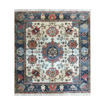 This beautiful Sand and Sea Hand Knotted Area Rug features an intricate floral design with rich colors, perfect for large living rooms. The vintage Persian rug showcases a stunning combination of reds, blues, and creams, making it an ideal choice for those looking to add a touch of elegance to their home decor. Perfect as a centerpiece in rugs for living room settings.
