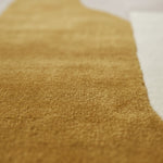 Close-up of a textured brown carpet