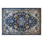 Top view of the Sapphire Arabesque Hand Tufted Wool Rug, an elegant area rug featuring intricate floral patterns in shades of blue and beige. Perfect for adding a touch of sophistication to living rooms, this 8x10 wool rug enhances any space with its detailed design.