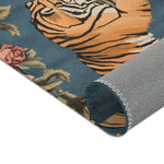 Rolled corner close-up of roaring tiger face and striped body with pink rose on slate-blue on the Savage Symphony Vintage Tapestry of Fierce Elegance