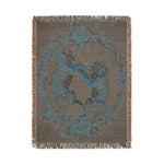 Dark charcoal woven blanket blue-toned tiger pair in circular floral frame taupe palette fringed