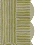 Close-up view of a scallop arch geometric hand-tufted wool rug, showcasing its intricate linear patterns in shades of green. This elegant area rug is perfect for adding a touch of sophistication to your living room. Ideal for those seeking large living room rugs with a unique design.