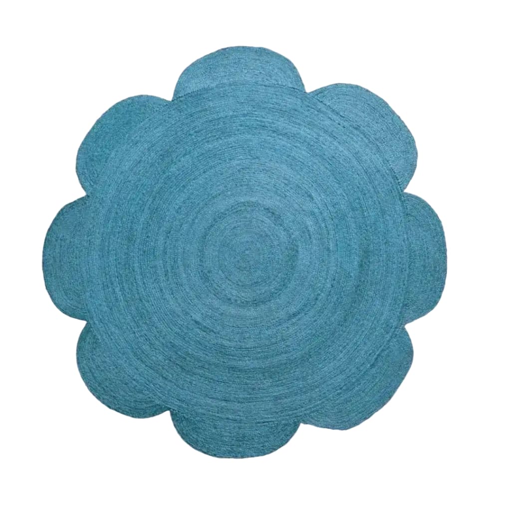Top view of a blue scallop flower round area rug, crafted from jute. Perfect for enhancing dining rooms, large living rooms, and formal dining spaces with its elegant design.