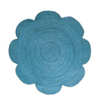 A vibrant blue scallop flower round jute rug, perfect for adding a touch of elegance to your dining room or large living room. This area rug features a unique flower-shaped design, ideal for both living room and formal dining room spaces.