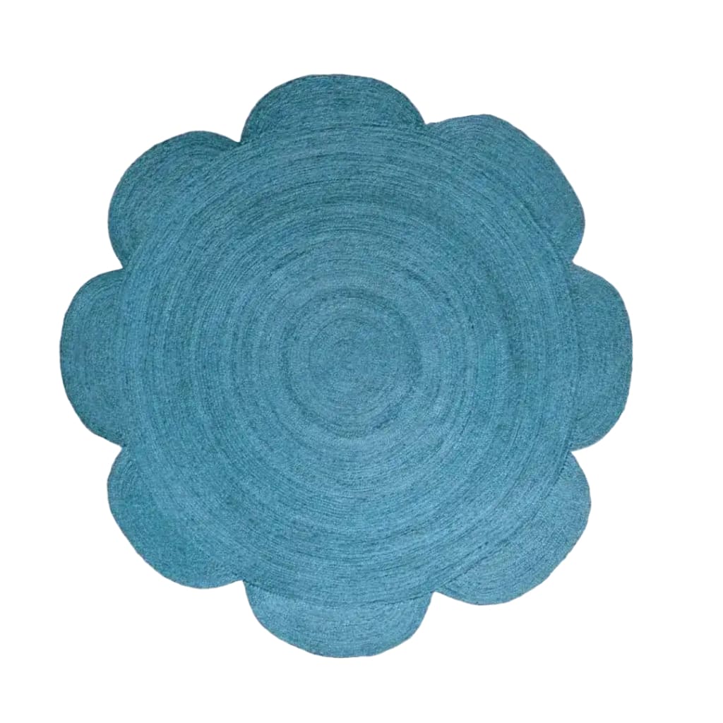 A vibrant blue scallop flower round jute rug, perfect for adding a touch of elegance to your dining room or large living room. This area rug features a unique flower-shaped design, ideal for both living room and formal dining room spaces.