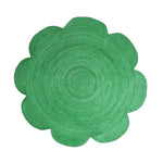 Top view of a Scallop Flower Round Jute Rug in vibrant green, ideal for adding a pop of color to your living room. This large area rug, measuring 8x10, is perfect for creating a cozy atmosphere in any living space.